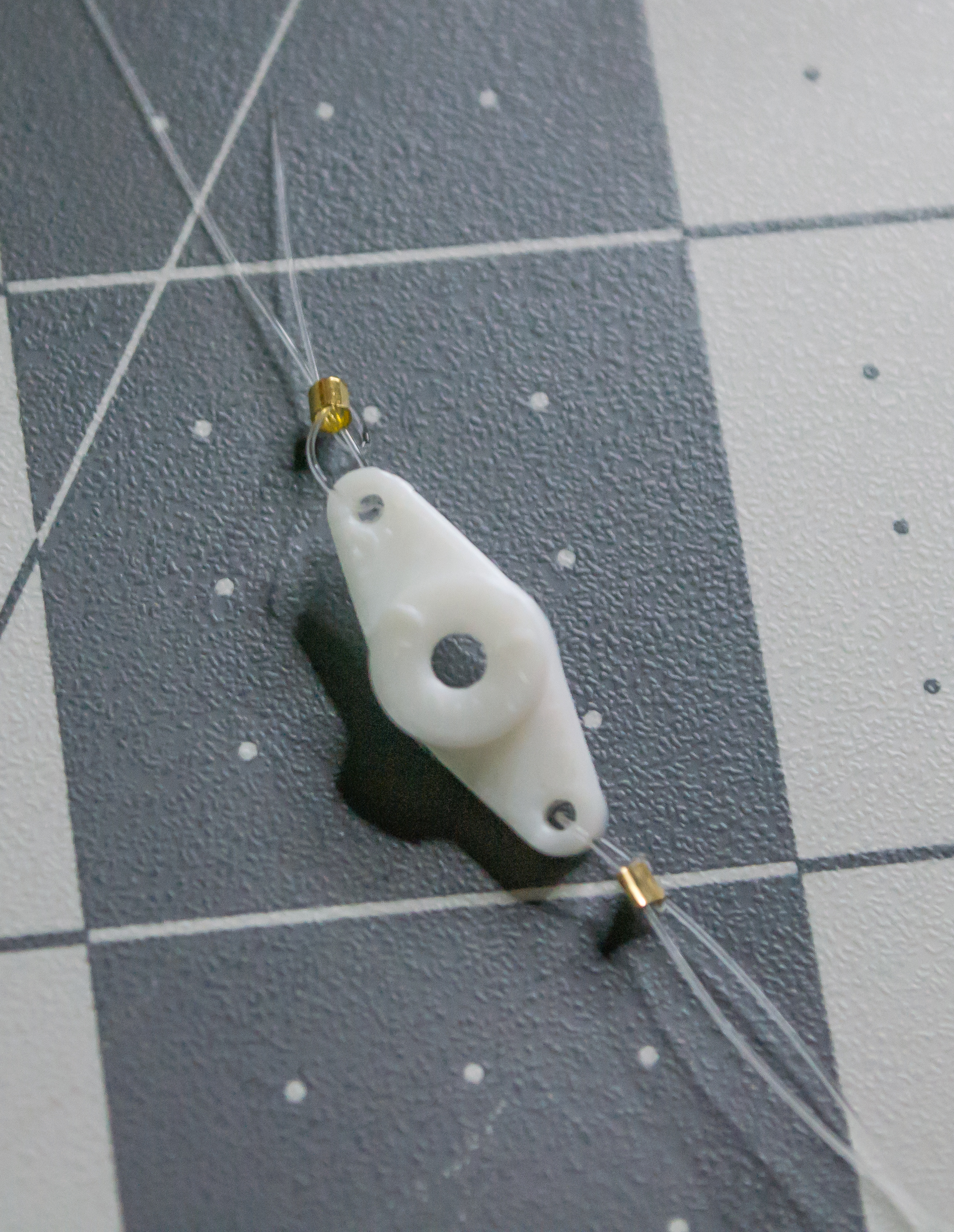 The final result of the arm component for VintageScale before crimping the top gold bead.