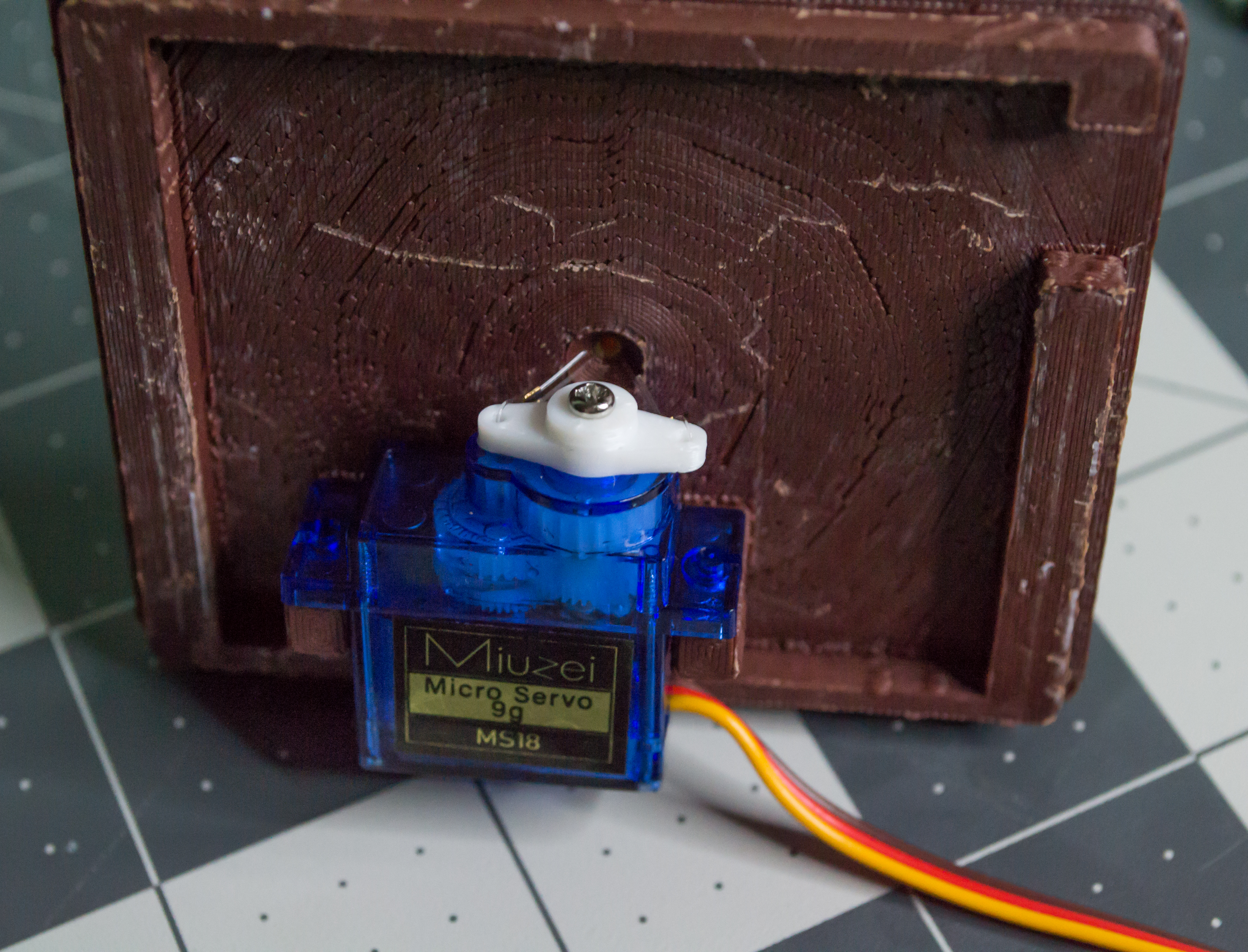 Placing the servo into place on VintageScale.