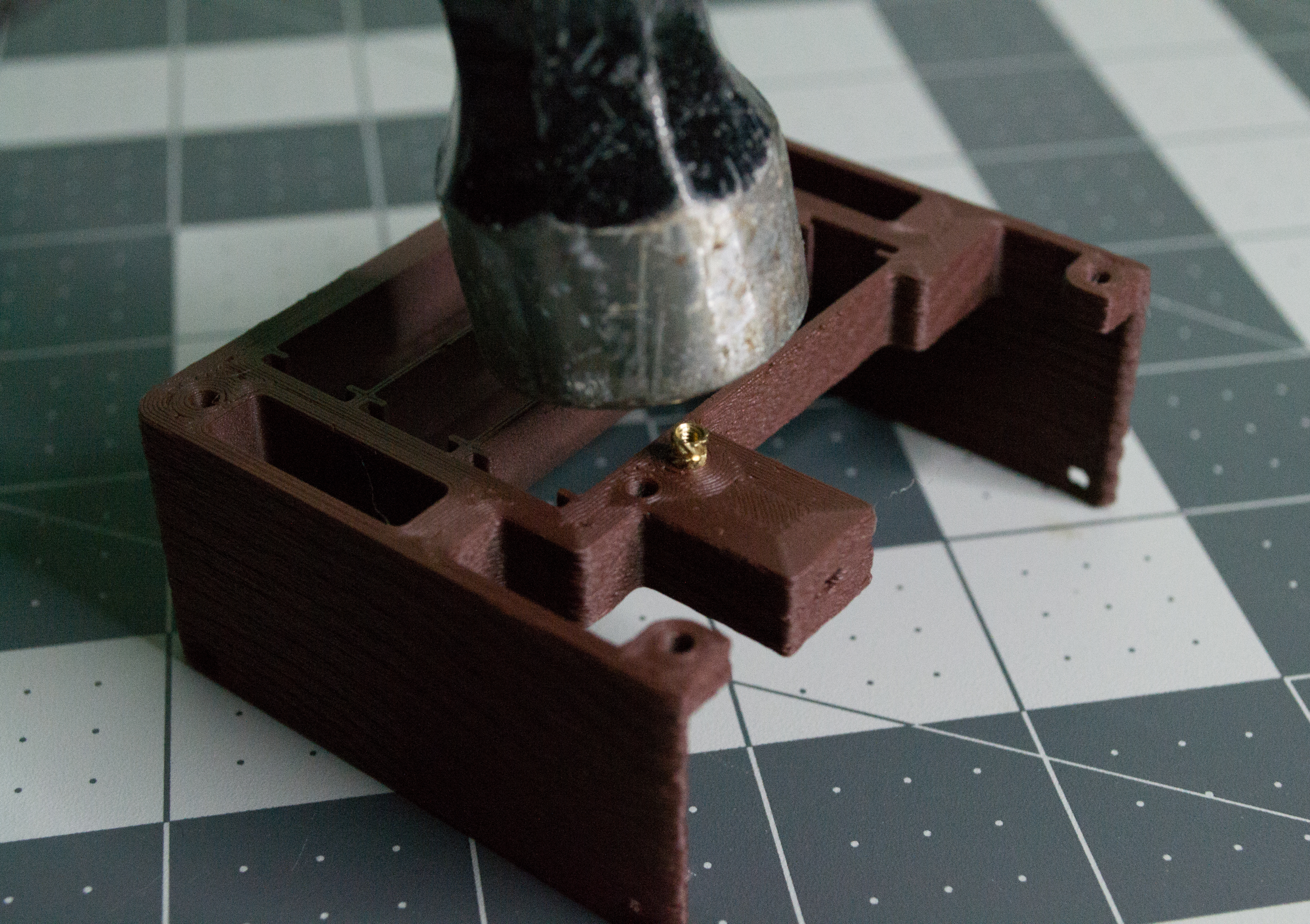 Hitting a metal insert into the body component of VintageScale.