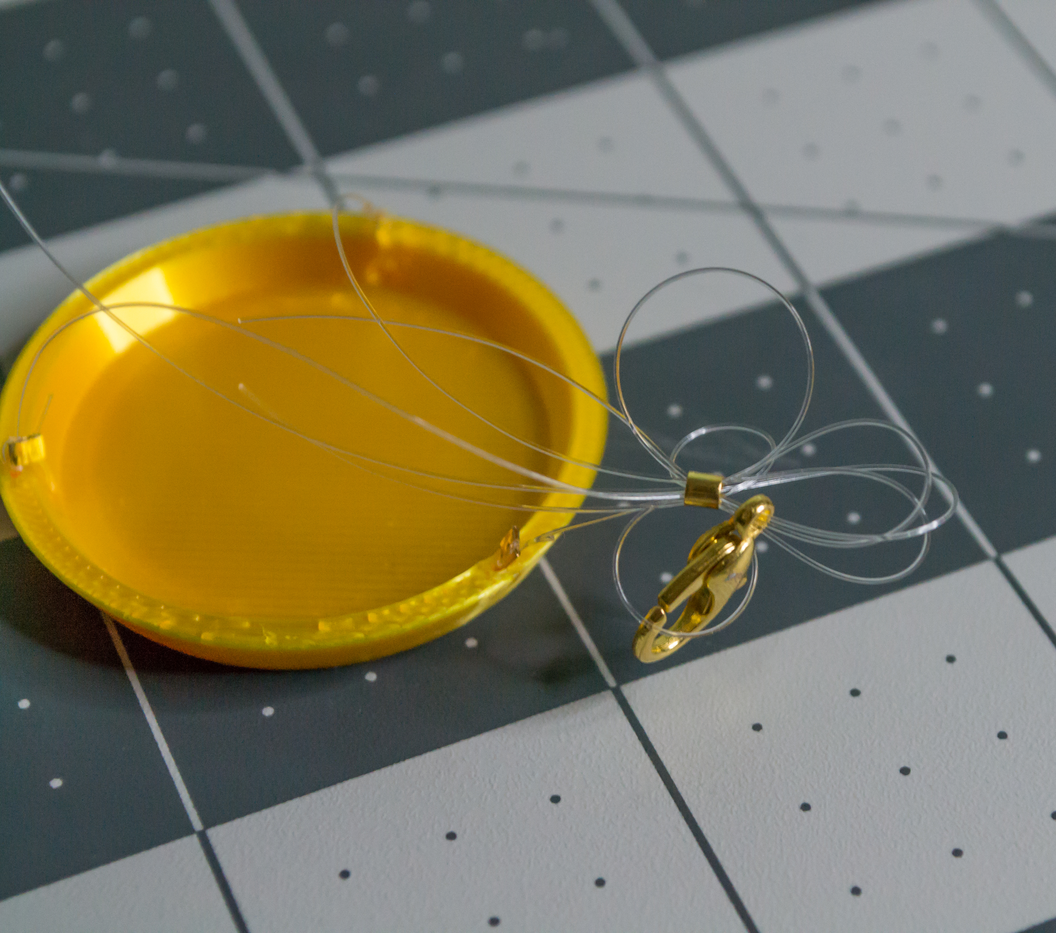 Looping three monofilament lines on VintageScale plate.