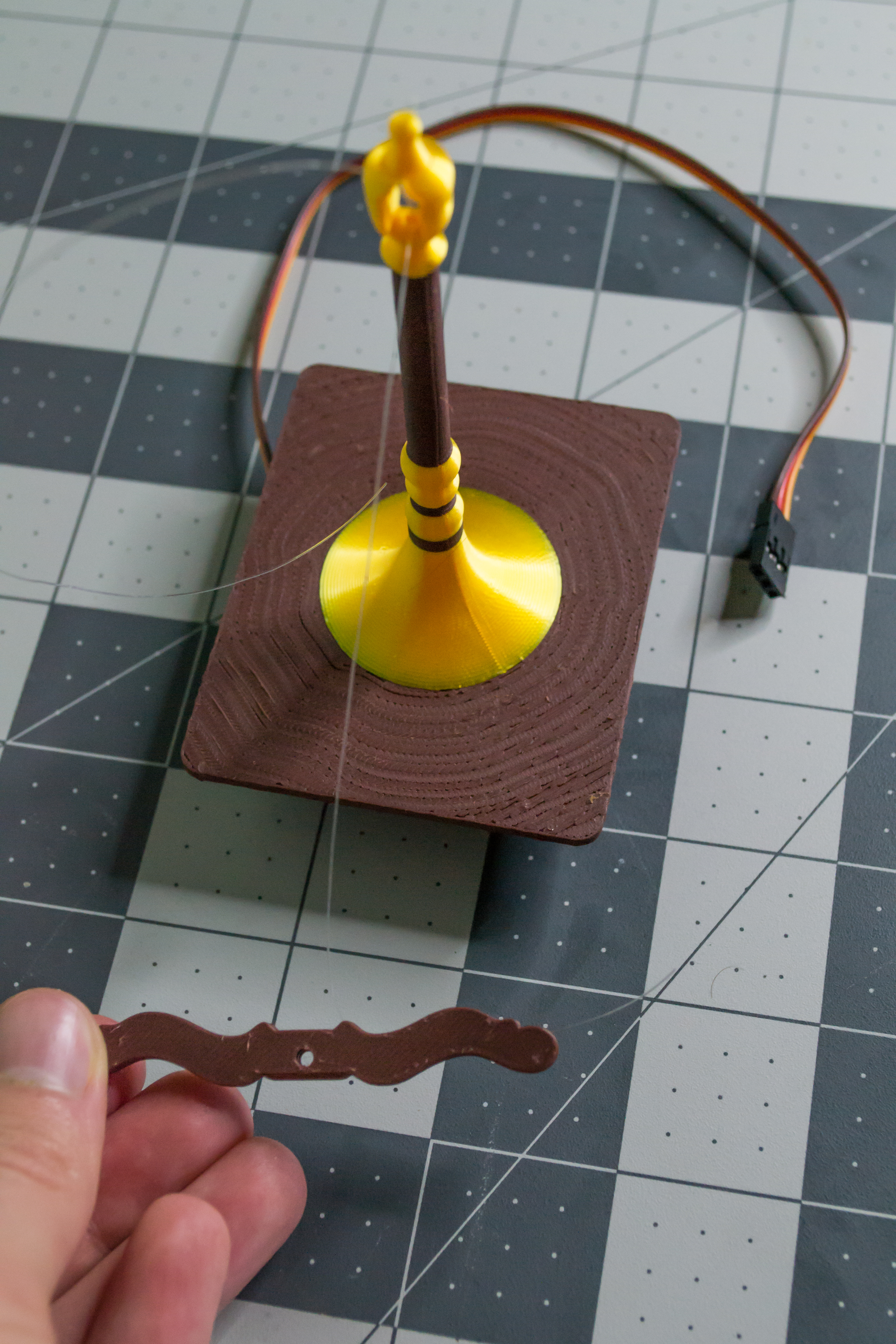 The inserted monofilament exiting the lever component on VintageScale.