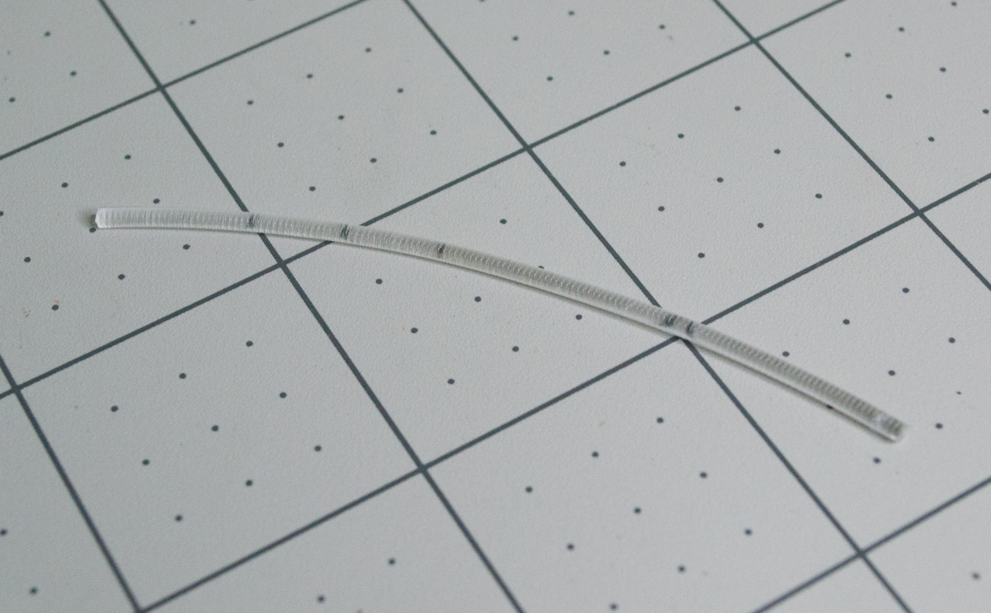Approximately 7.5 cm of filament is used to create the filament hinge in VintageScale.