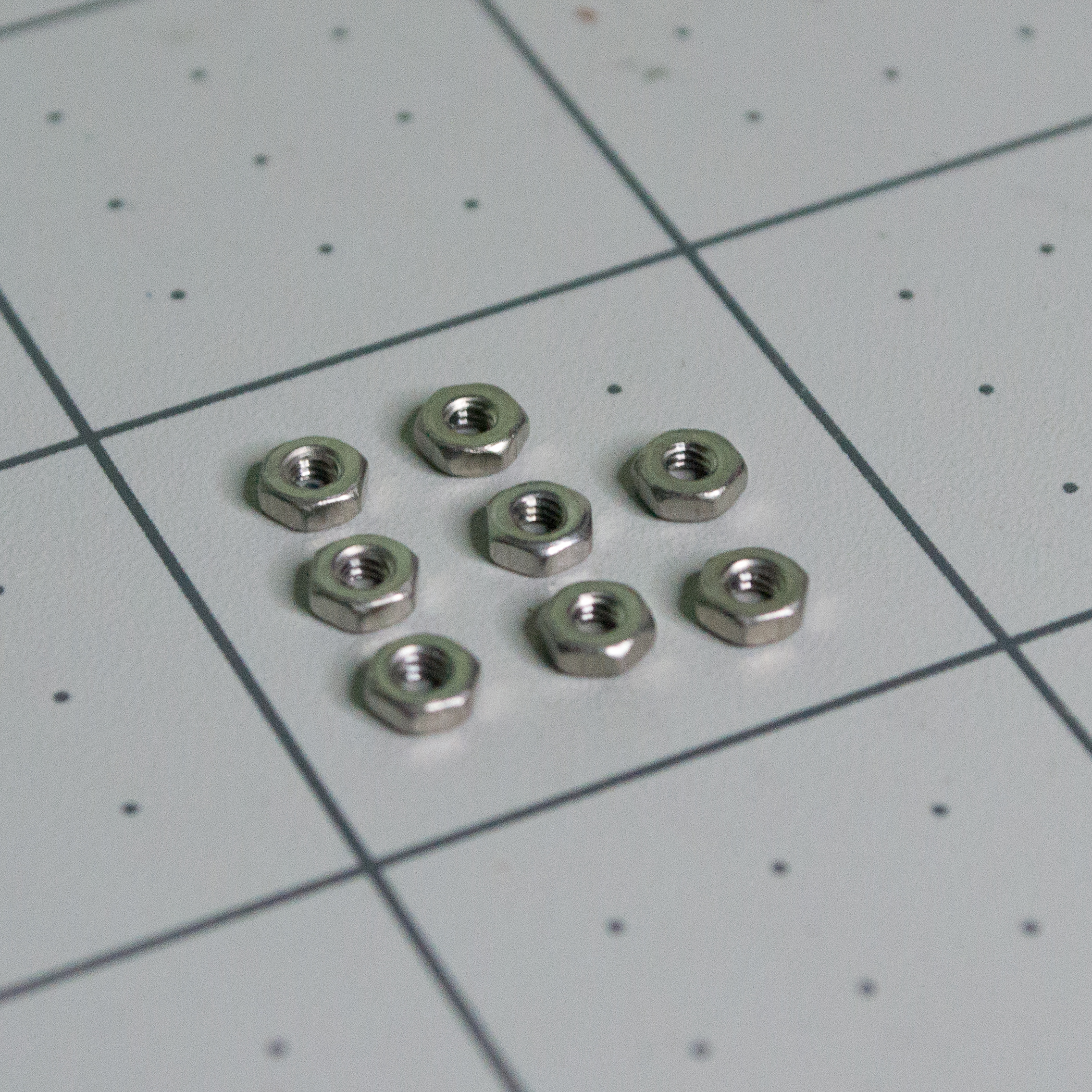 Silver M2 hex nuts for VintageScale.