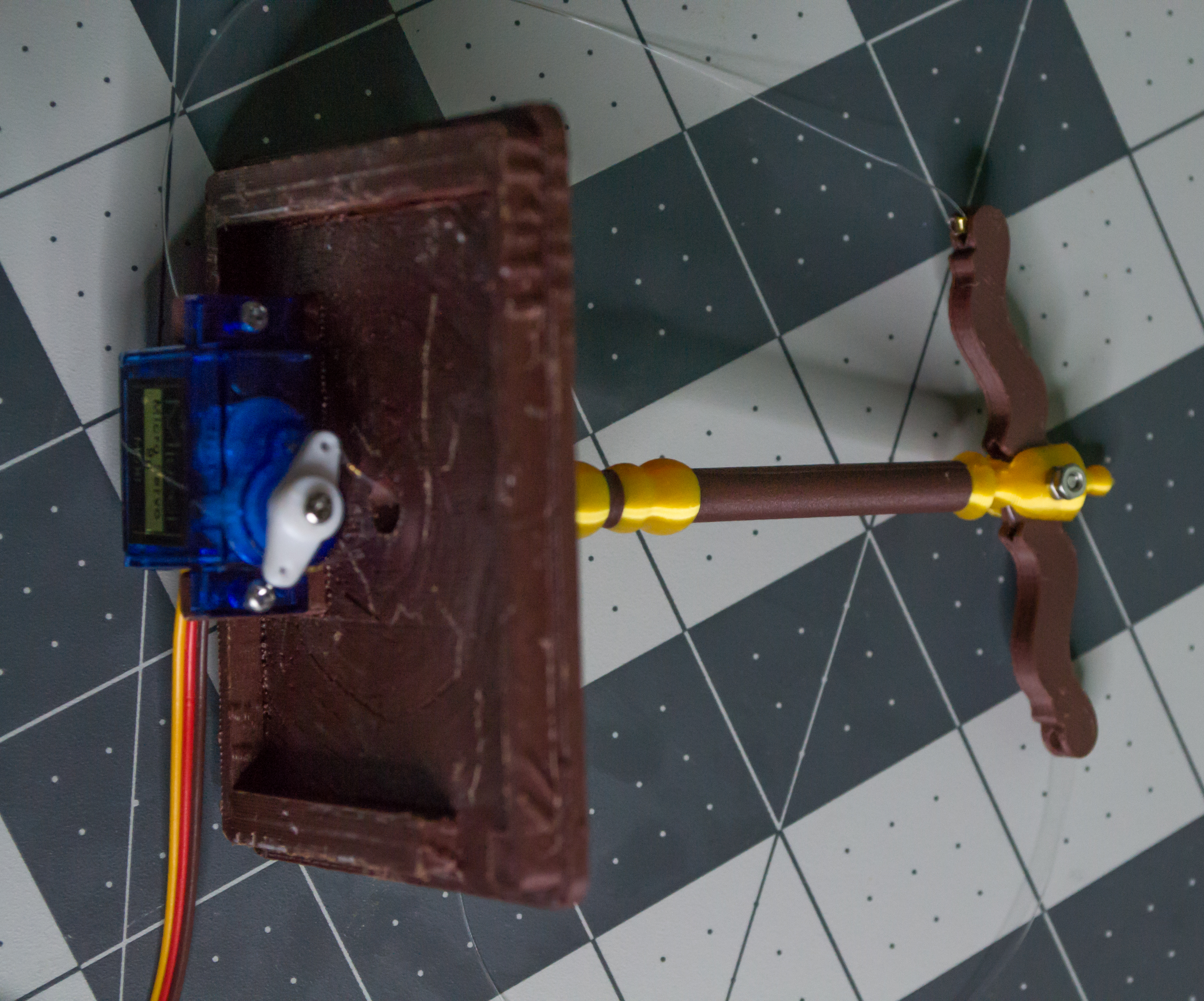 Moving the servo arm a little inward and the VintageScale lever inward toward the same direction to better position and tension the monofilament line.