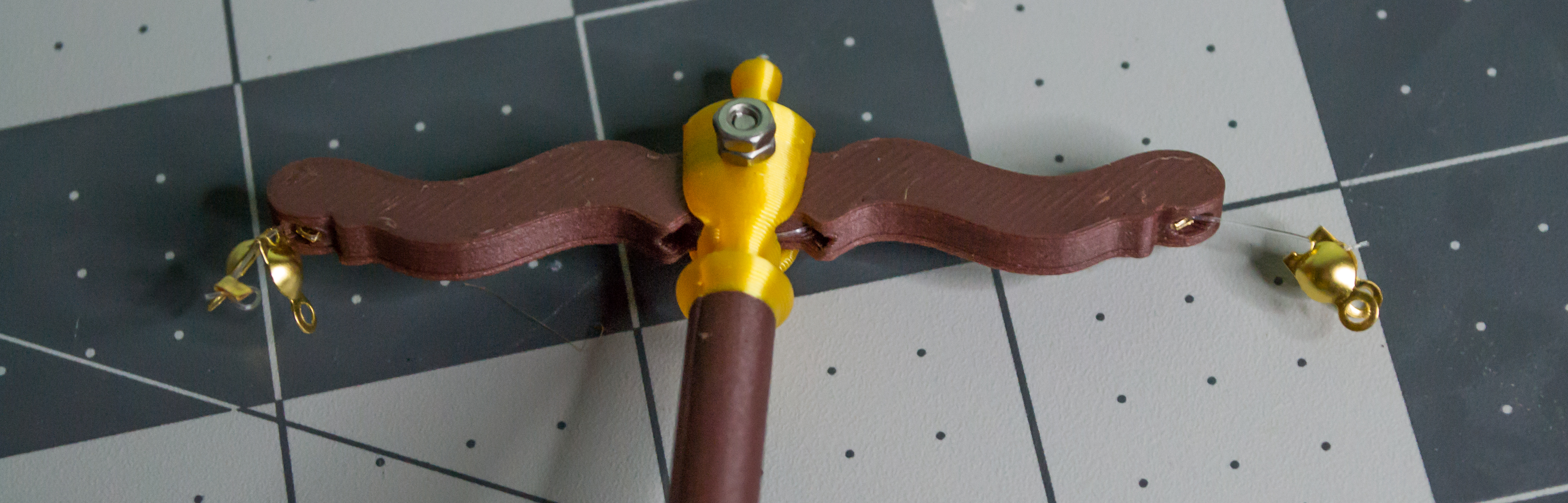 Both excess monofilament lines cut off on the VintageScale lever component.