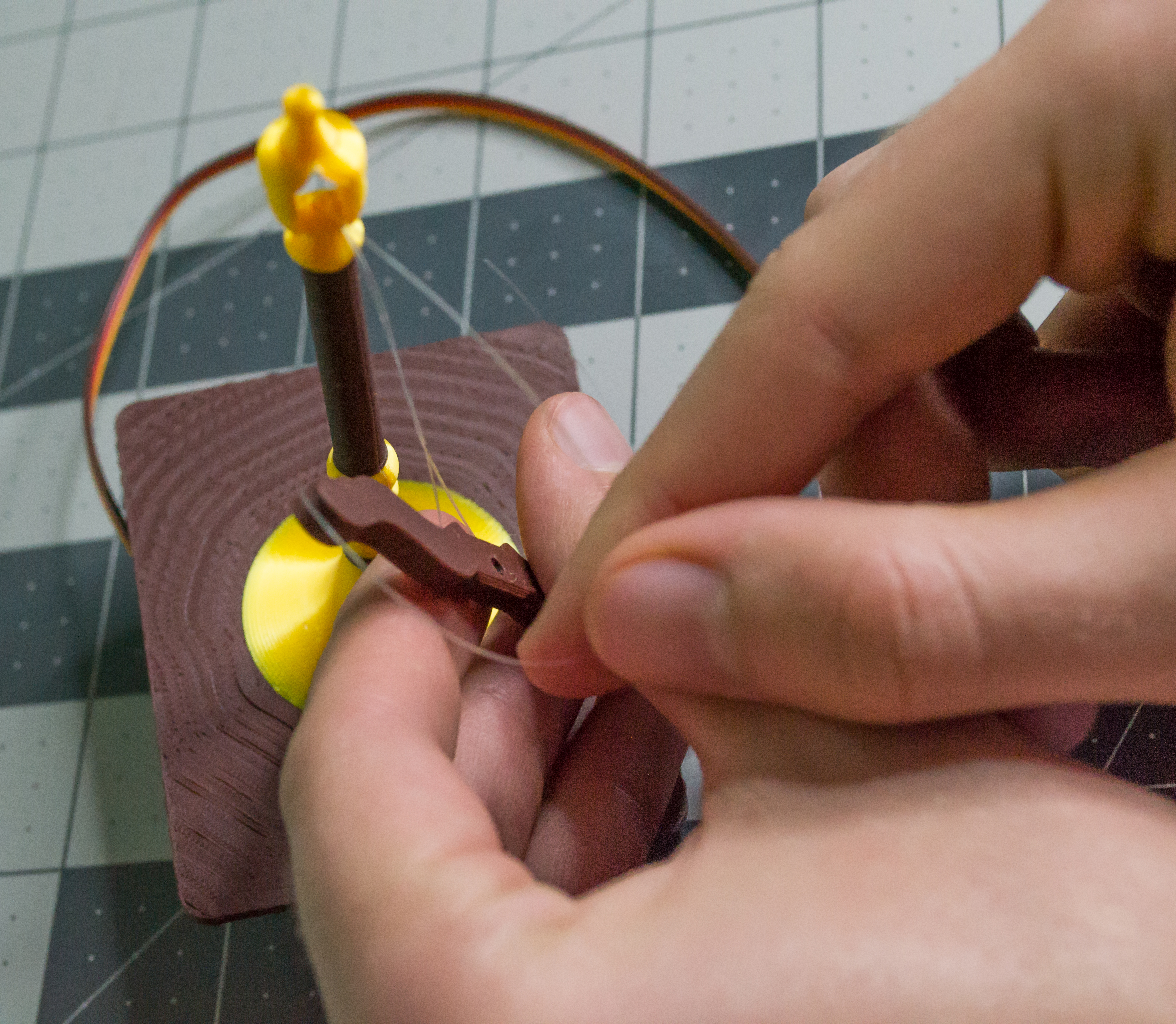Both monofilament lines exiting the lever component on VintageScale.