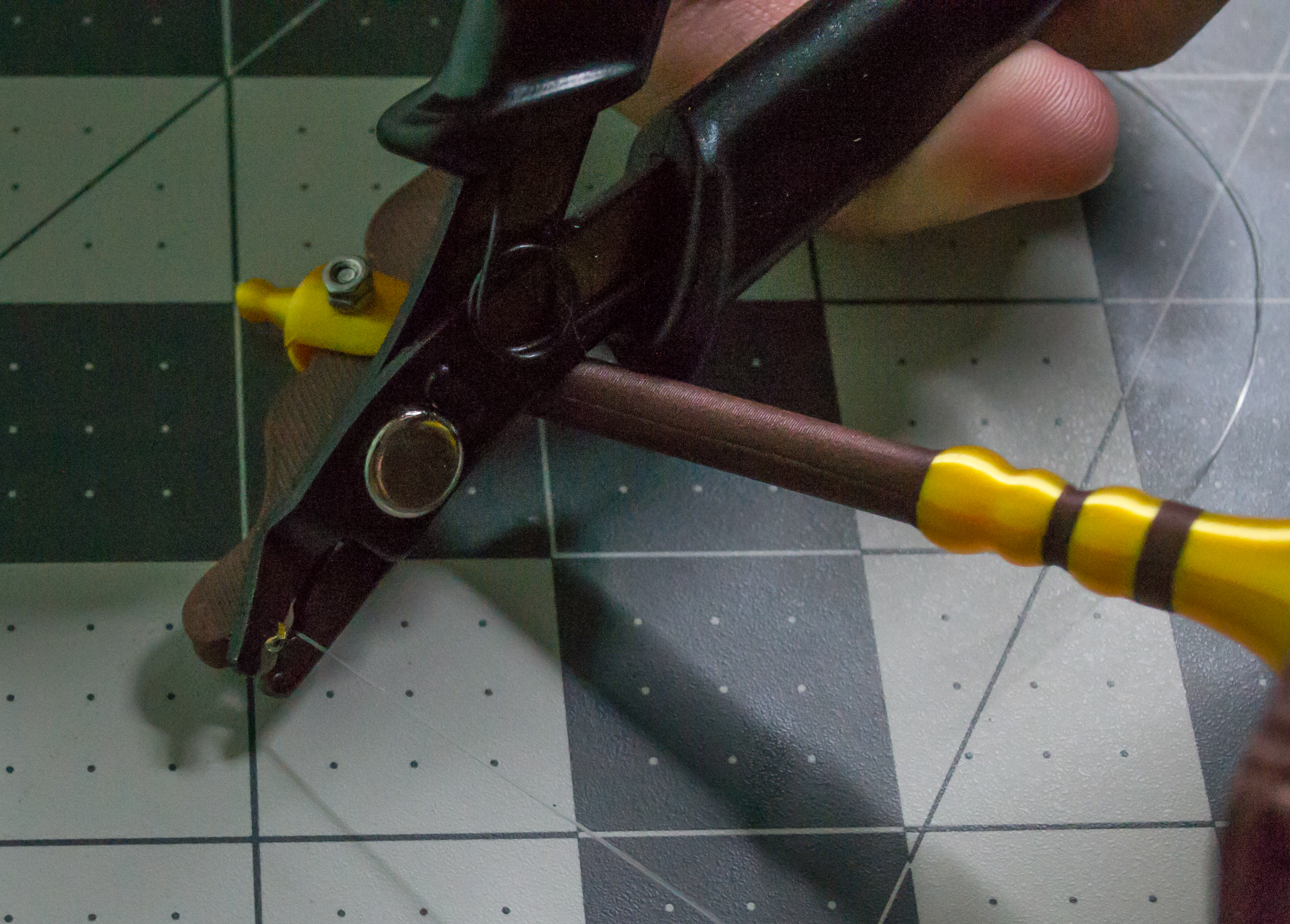 Crimping the small gold bead near the VintageScale lever.