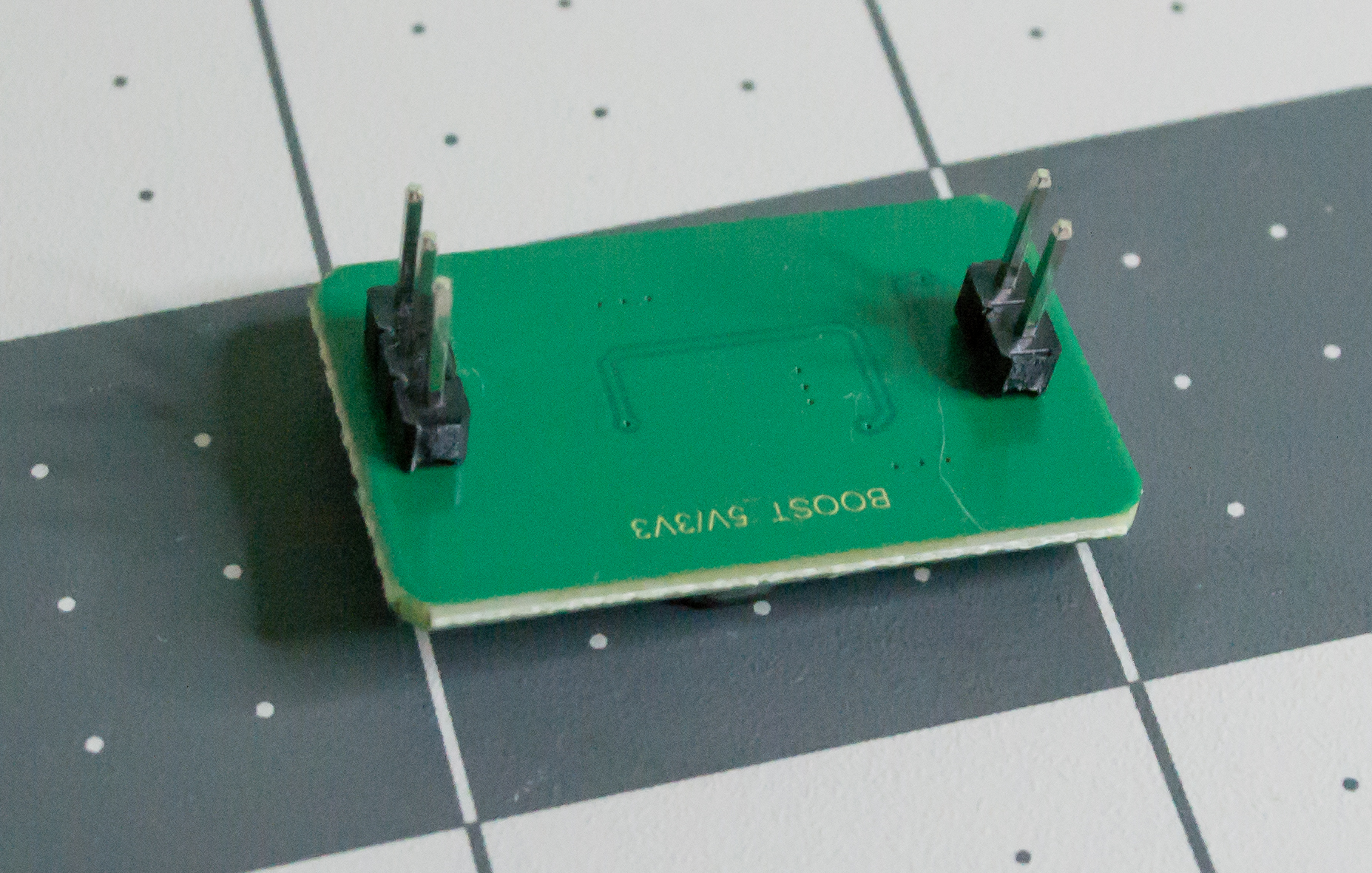 QEBIDUM DC-DC converter board with placed header pins.