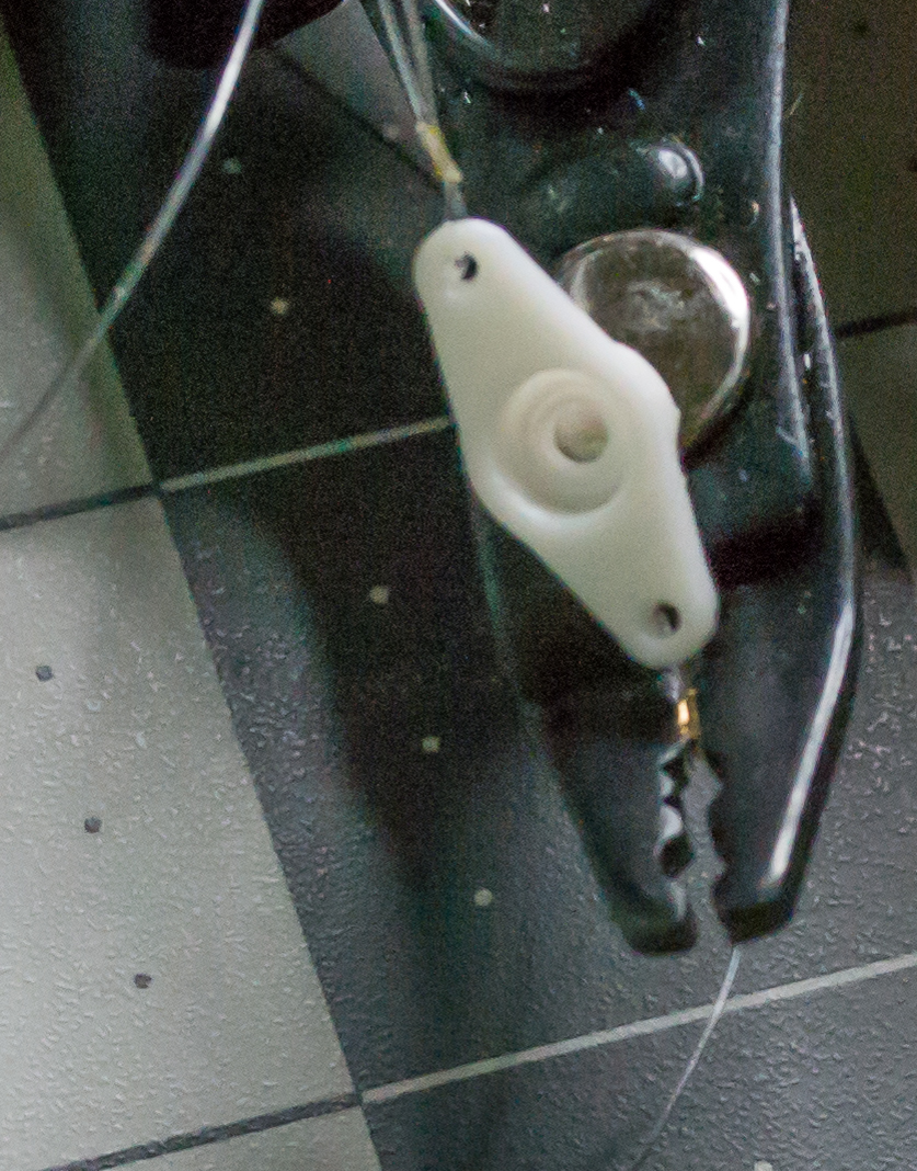 Crimping the gold bead for the arm component of VintageScale.