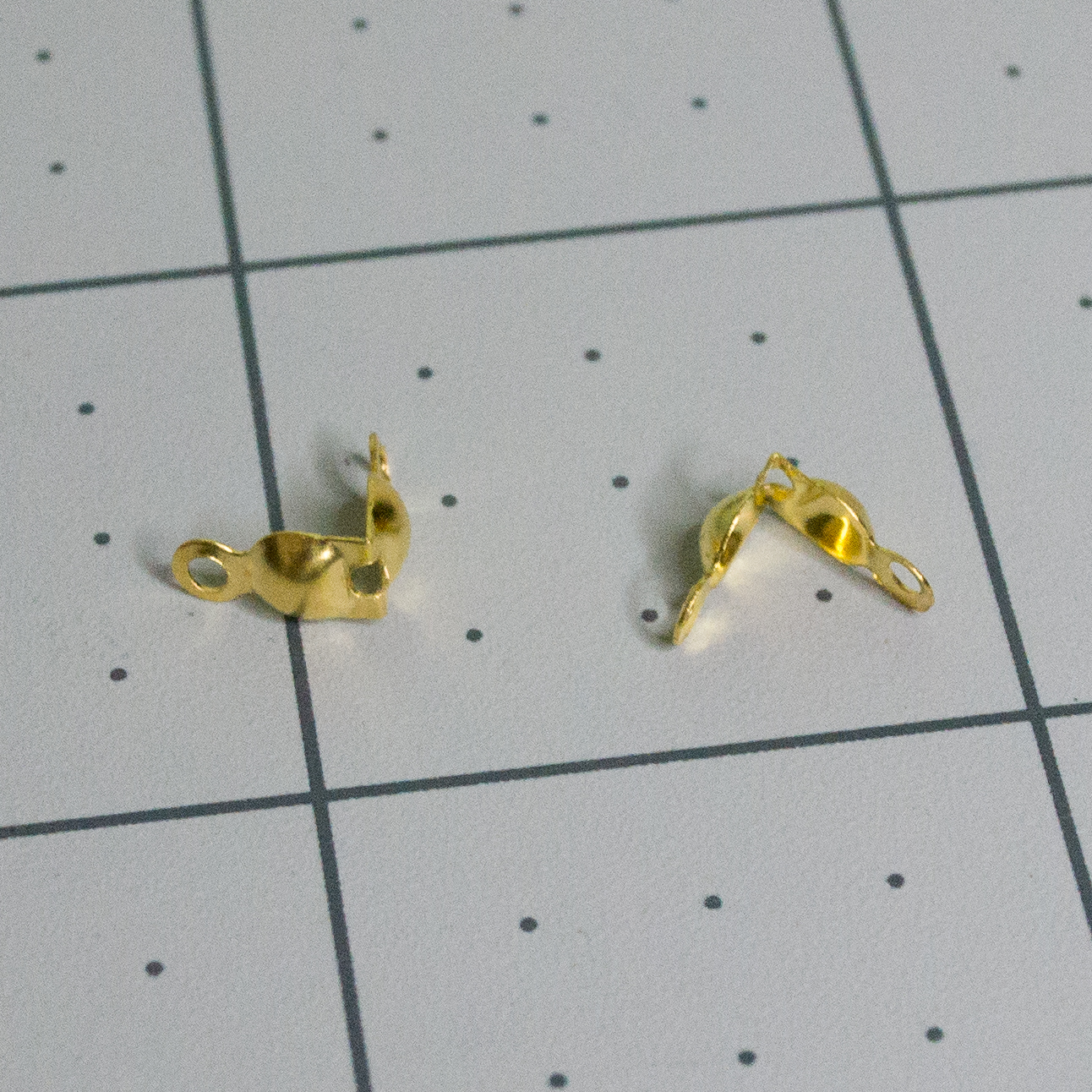Gold folded clamshell bead tips for VintageScale.